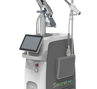 The image shows a piece of medical equipment, which appears to be a dental chair with a digital screen attached to its side, displaying some sort of information or interface, and there s a robotic arm mounted on top of the chair.