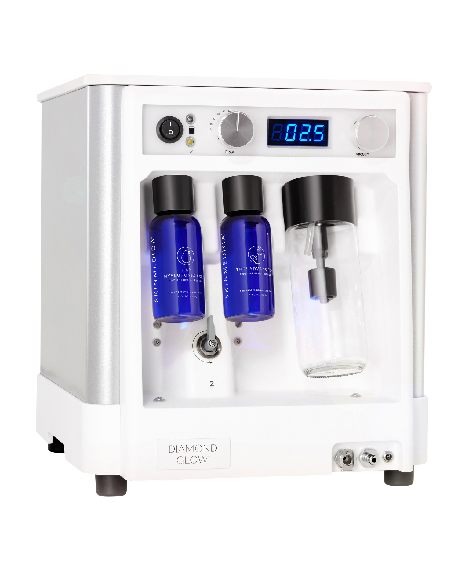 The image shows a white electronic appliance with a digital display, featuring three bottles and a clear glass jar on its surface, likely for dispensing or measuring substances, possibly for skincare or cosmetic purposes.
