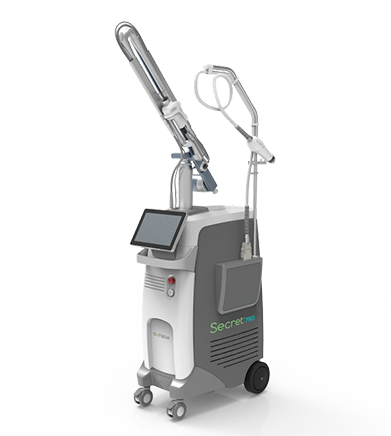 The image shows a medical device with a cart and a monitor displaying text, positioned on wheels for mobility, likely used for medical procedures requiring precise control and monitoring.
