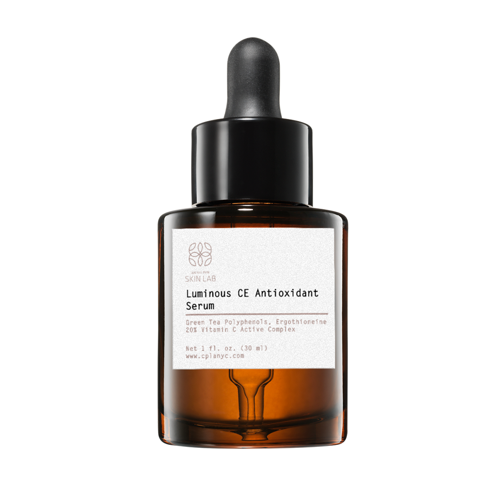 The image shows a bottle of  Luminos Antioxidant  skincare product with a dropper, placed against a white background.